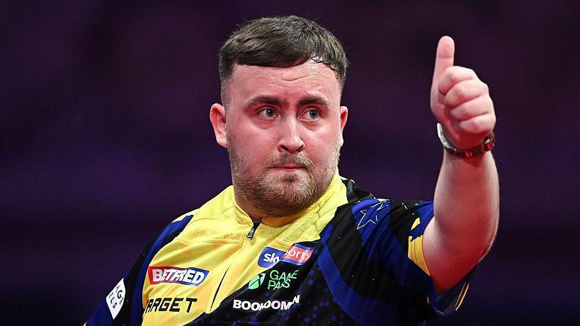 littler-cruises-into-matchplay-semis-with-download-over-rock