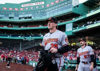 ta:-the-pink-sox-red-meat-up-their-catcher,-baltimore-receives-a-haul-and-waves-a-white-flag
