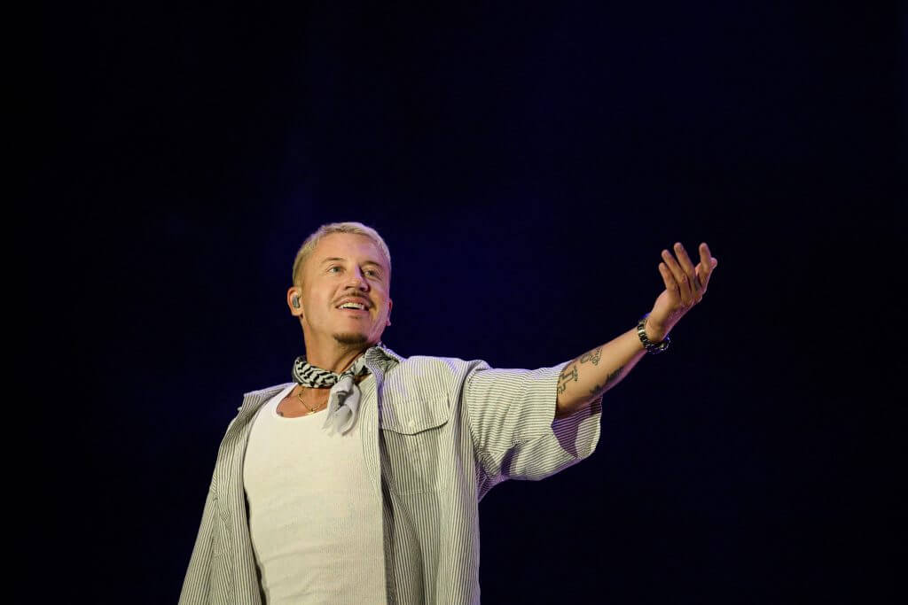 macklemore-forced-off-ed-sheeran-excursion-through-patriots-proprietor-over-palestine-feedback
